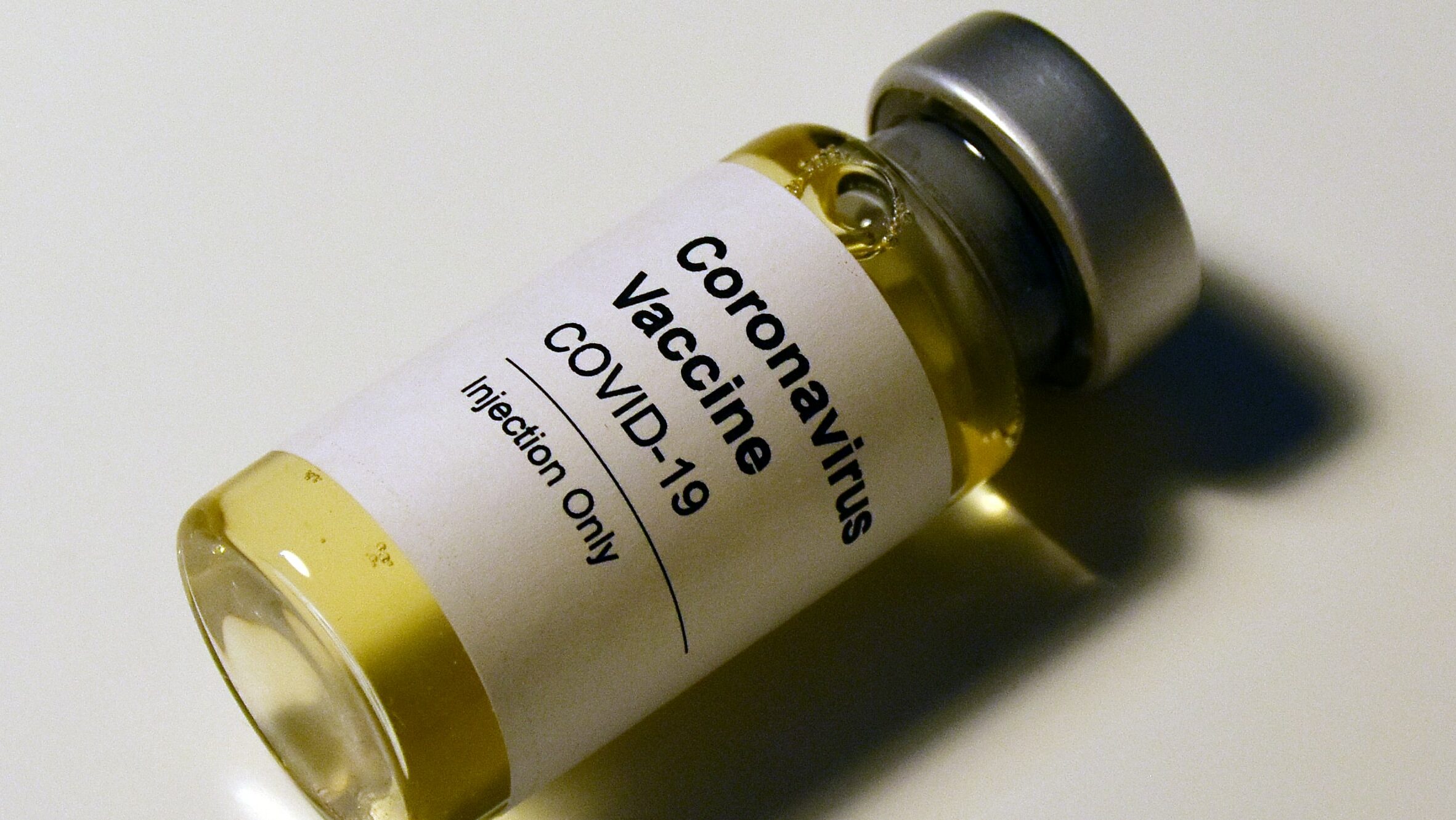 A vial reading Coronavirus Vaccine COVID-19 Injection Only.